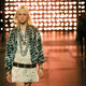 A model wears a creation by French-born designer Hedi Slimane for Saint Laurent mens Spring-Summer 2015 fashion collection, presented in Paris, Sunday, June 29, 2014.